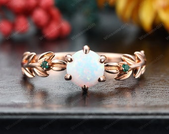 Round cut Opal engagement ring Nature inspied ring Emerald side stone ring Rose gold ring Unique leaf design ring Claw prong set ring