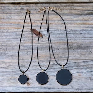 Black mirror Obsidian Natural Stone Disc Shape Pendant.Obsidian Natural Stone Disc Shape Pendant,often referred to as a black mirror.3 SIZES