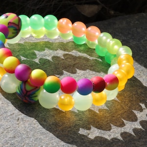 Glow in the dark - 2x bracelets UV Reactive Fluorescent Beaded Bracelets with glow in the dark. Combined with clay Blacklight beads.