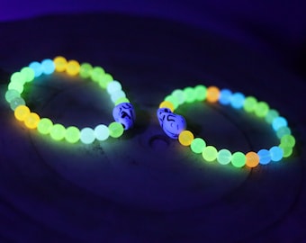 Bracelet 1 &2 - Luminous Acrylic Beads, different glow in the dark colors combined with UV Reactive Skull Beads.