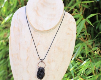 A tektite pendant made from rough tektite material can hold various meanings and symbolism. Extraterrestrial Connection