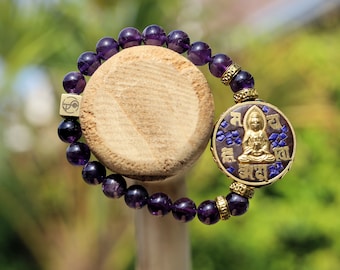 Inventive Natural Amethysts Crystal and amazing Guanyin bead combined with Wajakaa © Logo bead. It calms and stimulates the mind