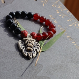 Exciting mixed Red/ black agate joined Demon Head. Excellent workmanship & detail. Lots of hand work in this design. supernatural entity