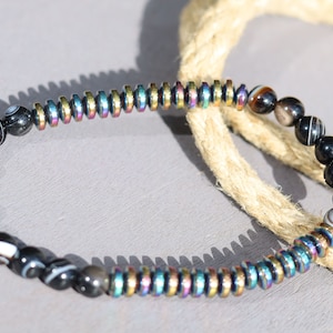 6mm Striped Agate Beaded Bracelet: Elevate your style with our Striking 6mm Striped Agate. energy and visual appeal