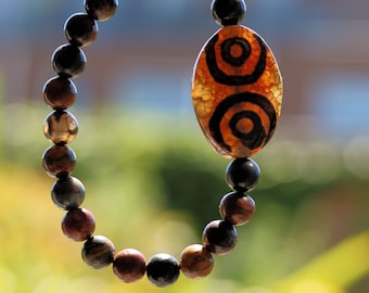 LIMITED EDITION Authentic 4-Eye dZi Beads. This precious bead is strung with new Natural Picasso Stone/Picasso Jasper Beads.