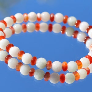 Beryl mix bracelet with Disc shaped Carnelian Agate.  to promote harmony and understanding among couples