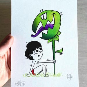 May include: Illustration of a cartoon figure sitting on grass, holding a green plant with a large, grinning head and purple tongue. The figure is wearing red shorts. The artwork is signed and includes the text "SUPER BOURDI".