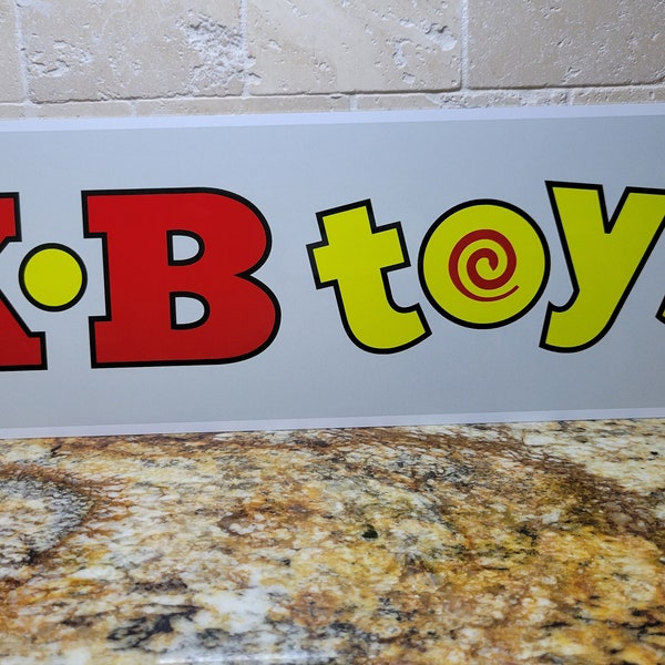 KB Toys Aluminum Sign  6" x 23"