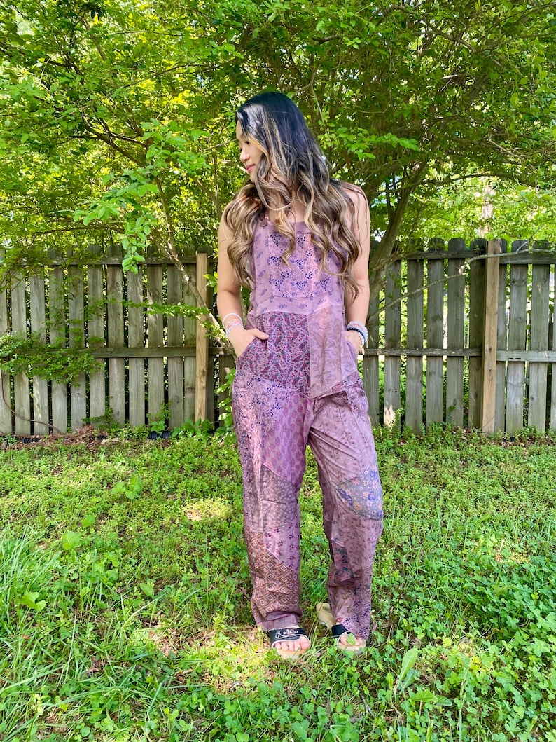 May include: A white ceramic mug with a black handle and the text "But First, Coffee" in a black, handwritten-style font. The mug is on a white surface.