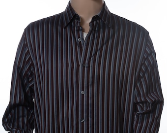 May include: A long-sleeved button-down shirt with vertical stripes in shades of burgundy and blue.