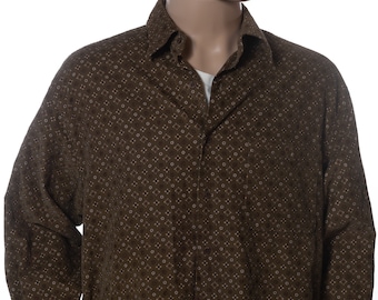 May include: A brown long-sleeved button-down shirt with a white and brown geometric pattern.