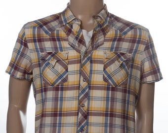 May include: A short-sleeved plaid shirt with a yellow, blue, and burgundy pattern. The shirt has a button-down collar and two chest pockets.