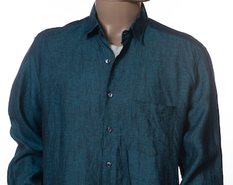 May include: A teal blue long-sleeved button-down shirt with a textured weave.