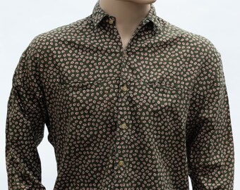 May include: A long-sleeved button-down shirt with a paisley pattern in shades of green and pink.