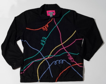 May include: A black jacket with a zipper closure and colorful lines embroidered on the front. The lines are in shades of red, orange, yellow, green, blue, and pink.