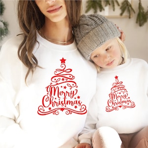 Mother and daughter christmas jumpers hot sale
