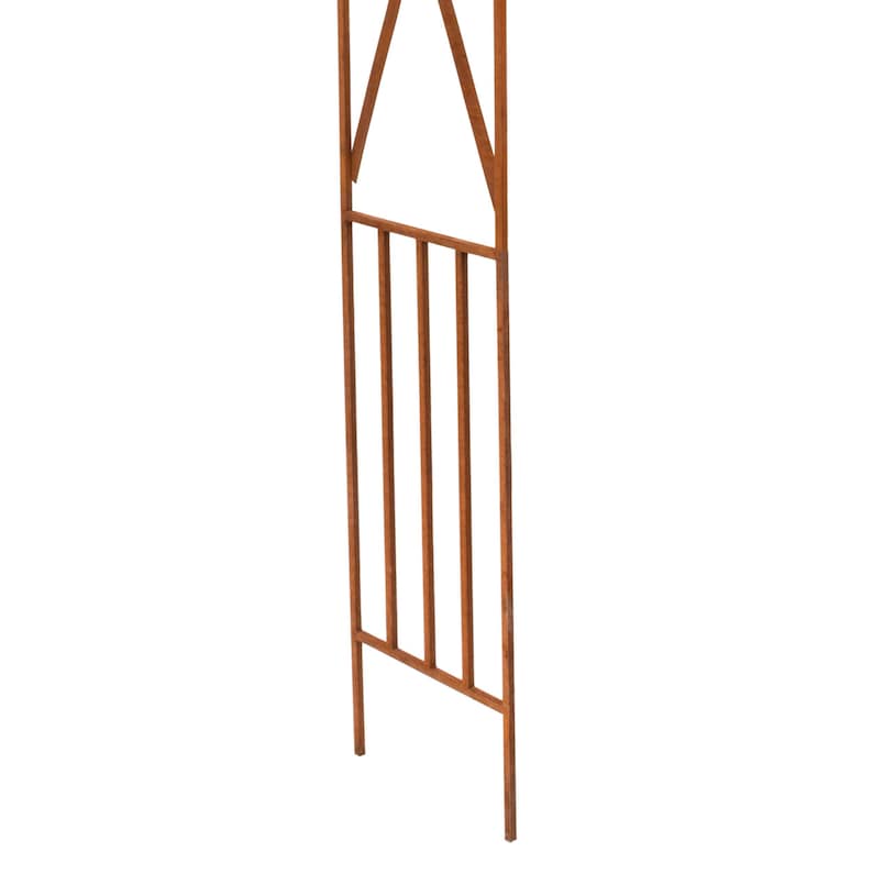 a wooden structure with vertical bars and a triangular opening at the top.