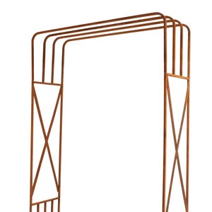 a metal structure with a repeating pattern of curved lines, creating an interesting visual effect.