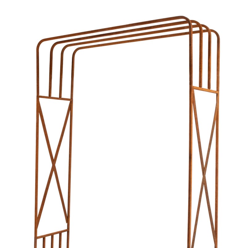 a metal structure with a repeating pattern of curved lines, creating an interesting visual effect.