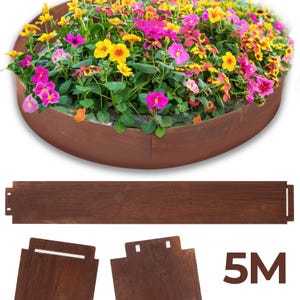 a large circular flower pot filled with a variety of colorful flowers, including pink, yellow, and orange blooms. The pot is placed on a wooden board, which is a part of a larger wooden plan. The image also includes a 5m (500mm) text, indicating the size of the wooden board.