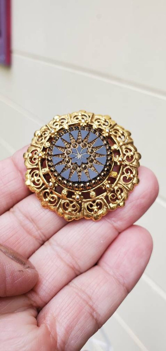 Golden Feligree Round Pin Brooch, Black Star Cent… - image 1