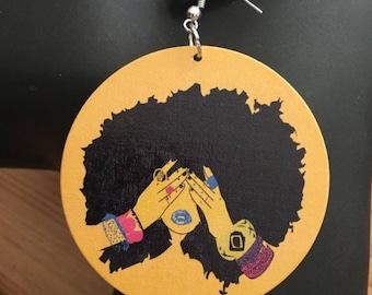 Brincos de menina afro africana