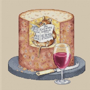 May include: A cartoon mouse sits inside a large block of cheese, reading a newspaper titled "The Evening Nibble". A glass of red wine and a cheese knife are on a dark gray plate.