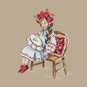 Ukrainian girl with embroidery cross stitch pattern