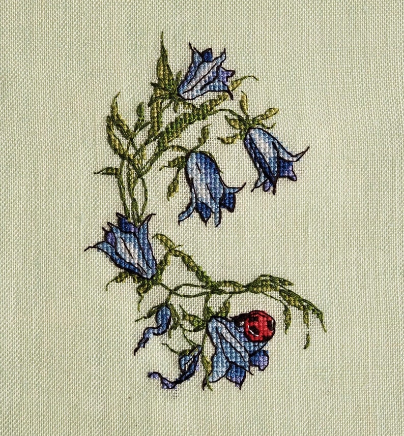 the blue flower cross stitch designer