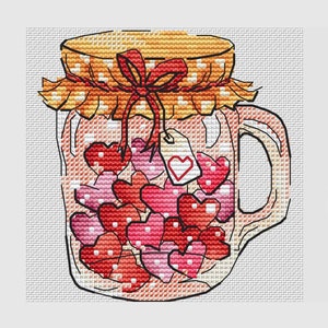 Heart shaped candy cross stitch pattern