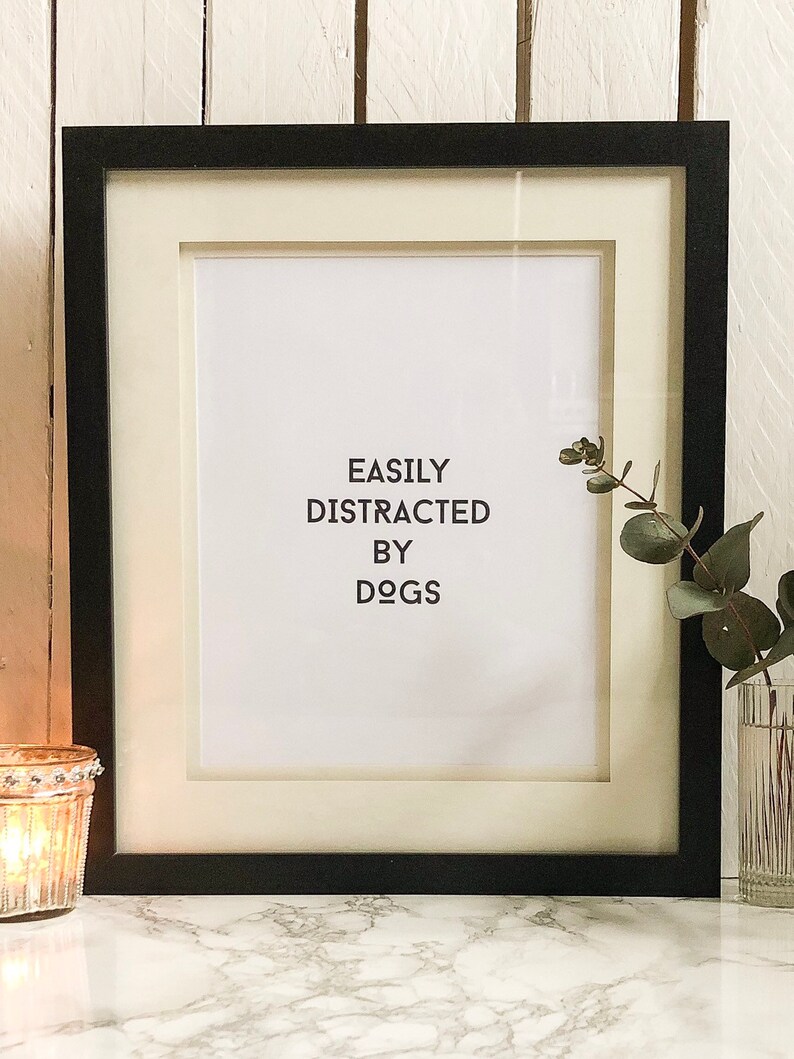 Easily distracted by dogs monochrome slogan un-framed print