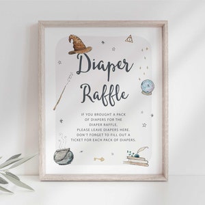 May include: A white sign with a wooden frame, featuring a watercolor illustration of a witch's hat, wand, cauldron, and a book. The sign reads "Diaper Raffle" and includes instructions for guests to leave diapers for a raffle.