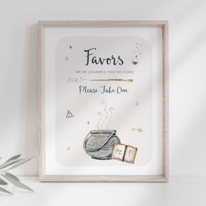 May include: A printable sign with a whimsical illustration of a cauldron, a wand, and a book. The text reads "Favors We're charmed you've come Please take one".