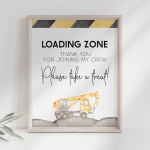 Może przedstawiać: Drukowana tabliczka z żółtym samochodem budowlanym i tekstem "Loading Zone. Thank you for joining my crew. Please take a treat!"