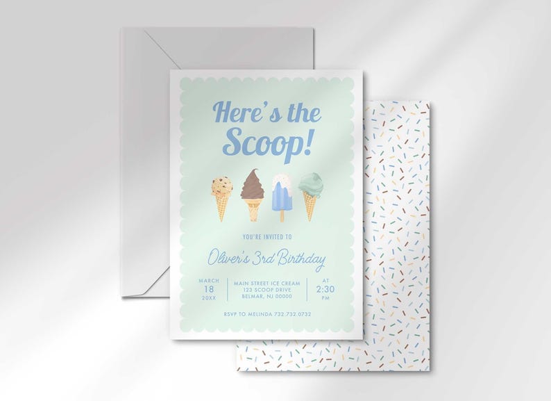 The invitation's front design shown angled and stacked in front of a matching pastel sprinkle-pattern back and a gray envelope.