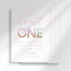 Elegant white "Sweet ONE" first birthday invitation for Olivia, with soft pink cursive script, pastel confetti lettering, and a colorful sprinkle-pattern side border.