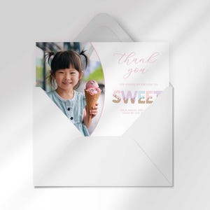 The ice cream-themed photo thank you card for Olivia peeking out of a white envelope.