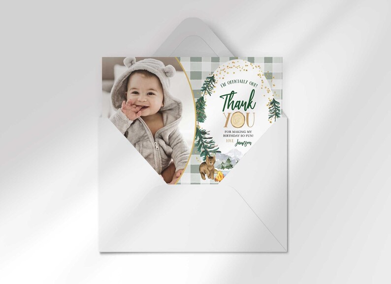 Jameson's camping-themed thank you photo card tucked inside its matching envelope, showing the baby's photo mockup and party thank you message.