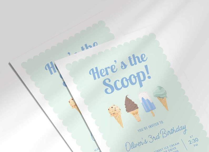 Close-up angled shot of two overlapping printed invitations, highlighting the ice cream cone illustrations and the bold "Here's the Scoop!" text detail.