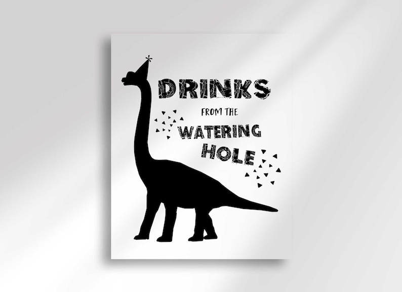 A vertical sign featuring a black silhouette of a long-necked dinosaur with the text Drinks From the Watering Hole.