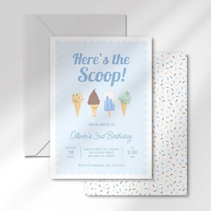 Invitation card angled in front of the matching colorful sprinkle-pattern back and a white envelope.