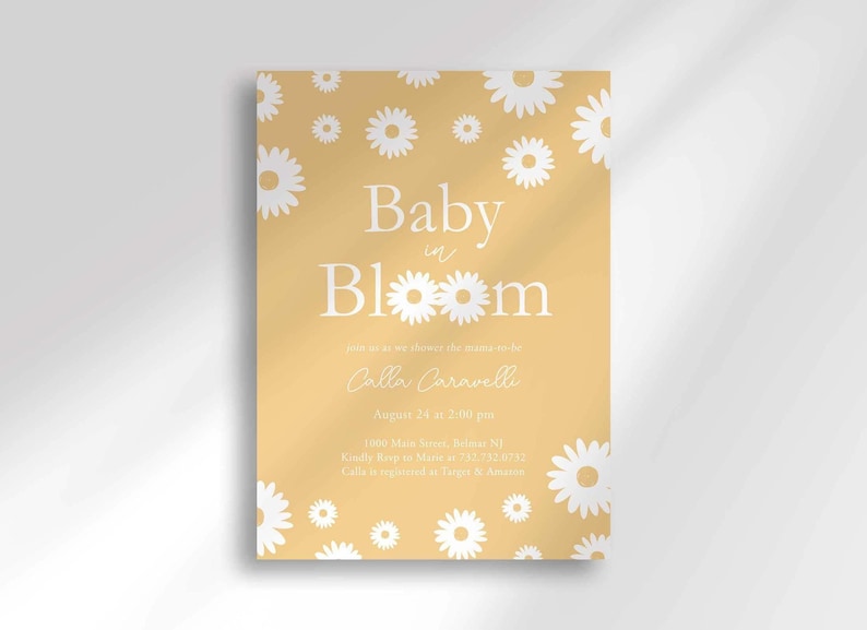 Daisy-themed baby shower invitation in mustard yellow with a white daisy pattern, reading 'Baby in Bloom' for Calla Caravelli, with the party date, time, location, and registry details.