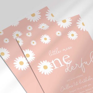 Angled close-up view of printed Little Miss Onederful pink daisy first birthday invitations.