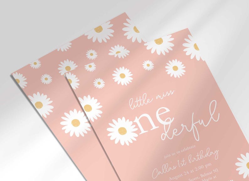Angled close-up view of printed Little Miss Onederful pink daisy first birthday invitations.