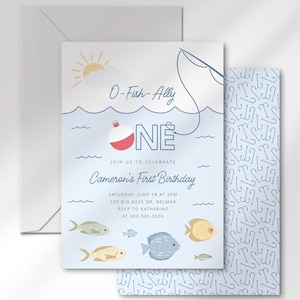 May include: A blue and white birthday invitation with a fishing theme. The invitation says "O-Fish-Ally One" and includes a red and white fishing bobber, a fishing rod, and a blue and white fish. The invitation is for Cameron's First Birthday.