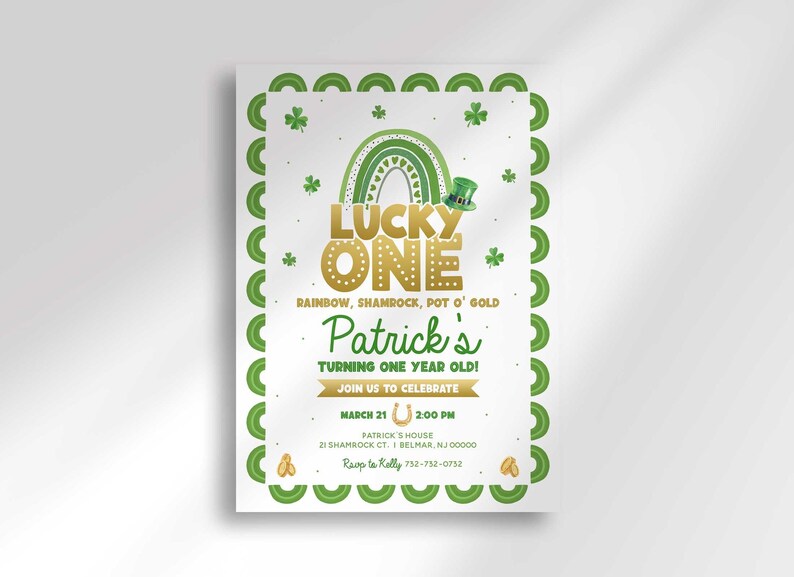 Flat product shot of the Lucky One St. Patrick's Day first birthday invitation, scalloped green shamrock border and gold rainbow illustration, text reading Patrick's Turning One Year Old with party details.