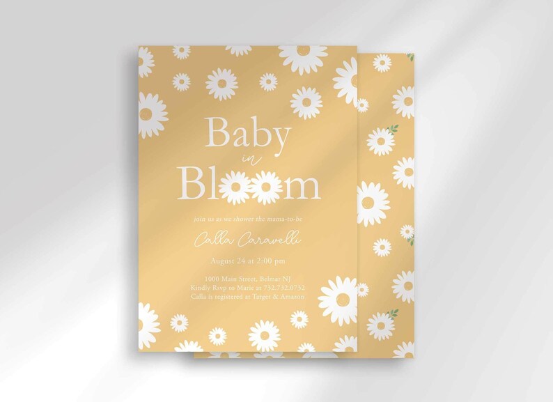 The 'Baby in Bloom' invitation for Calla Caravelli with a second card showing the daisy pattern back design peeking out behind it.