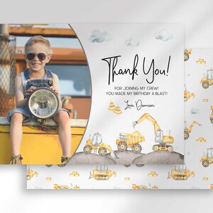 Damian's construction-themed thank you photo card with the boy's photo mockup layered in front of a second card showing a scattered dump truck and excavator back design.