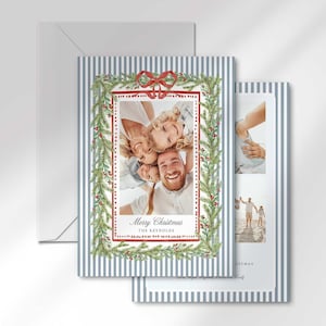 Two Christmas greeting cards displayed with an envelope, showing the front design with a family photo and a glimpse of the photo collage back design.