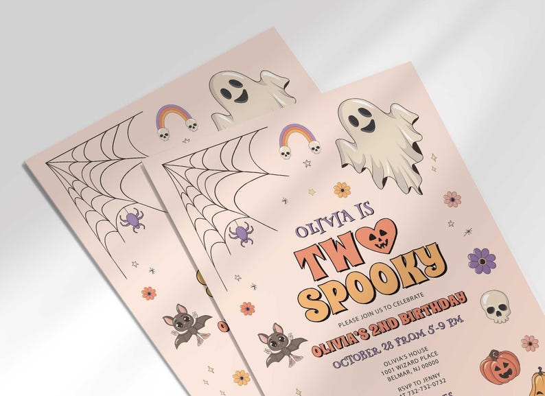 Angled close-up of Olivia's Halloween-themed second birthday invitation, showing the ghost, spiderweb, and pumpkin illustrations with party details.